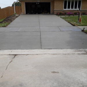 Newly paved concrete driveway installed