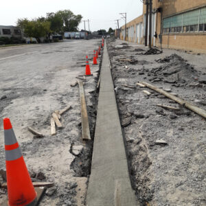 Street curb construction progress underway