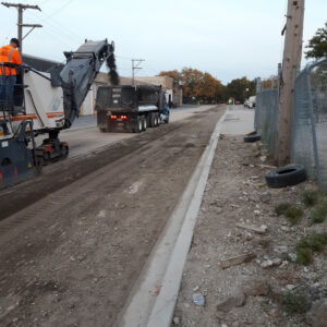 Road construction with dump truck