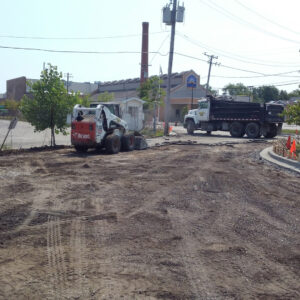 Construction site with asphalt paving machinery