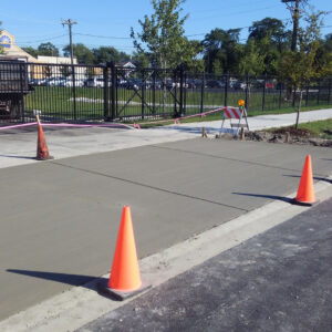 Freshly-poured concrete with cones