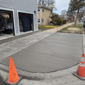 Freshly poured residential concrete driveway