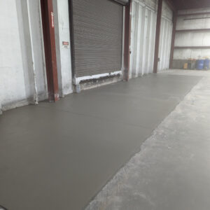 Freshly poured concrete warehouse floor