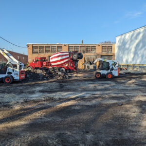 Construction site with cement trucks working