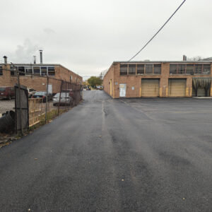 Freshly paved industrial parking lot